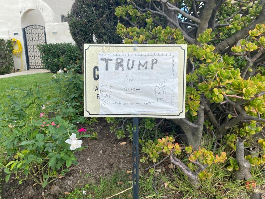 KIDS: A handwritten pro-Trump sign in Pico-Robertson was pasted on top of a Curb your dog sign on somebodys front lawn.