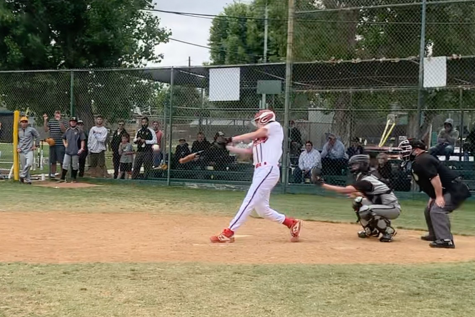 SWING: Above, Josh Harrison hits a game-ending single to left centerfield at the bottom of the seventh inning at East Valley Baseball Fields last Sunday