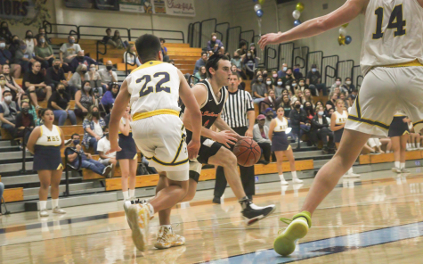 AGGRESSIVE: Senior Ze’ev Remer dribbles into the paint in a hard-fought CIF semifinals game against the Marina Vikings. He scored 37 points in the game at Marina High School in Huntington Beach.