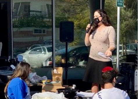 SERVICE: Mrs. Hametz gave instructions at a pie-baking event for Thanksgiving last November in the parking lot. She arrived at Shalhevet in 2019 and will teach at Berman Hebrew Academy this fall. 