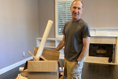 MOVING: Mr. Diamond got boxes ready for his cross-country move last week. He and his family are relocating to his home city of Philadelphia.