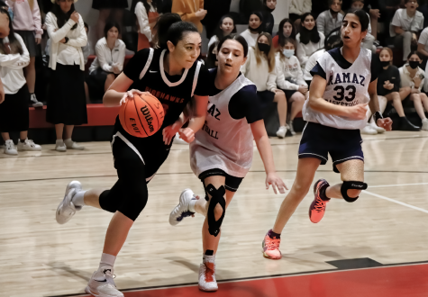 POWER: Firehawk co-captain Talia Tizabi dribbles around a Ramaz defender in the quarterfinals game on Friday. The Firehawks won that game 60-47, and Talia went on to be named tournament MVP. To see more pictures, click on Gallery above.