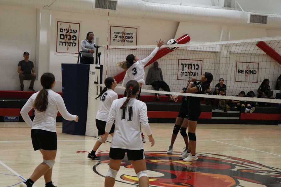 NET: Senior Noa Talasazan hit the ball over the net Sept. 8 in Shalhevet’s victory over Compton Early College High School. 
