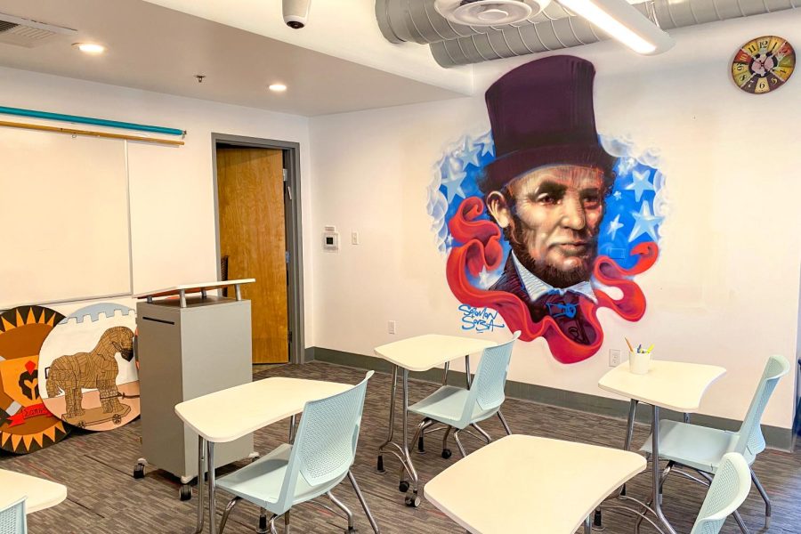 HISTORY: A Souza mural of Abraham Lincoln decorates a wall in Room 308, where Dr. Keith Harris teaches history classes including SAS Civil War.