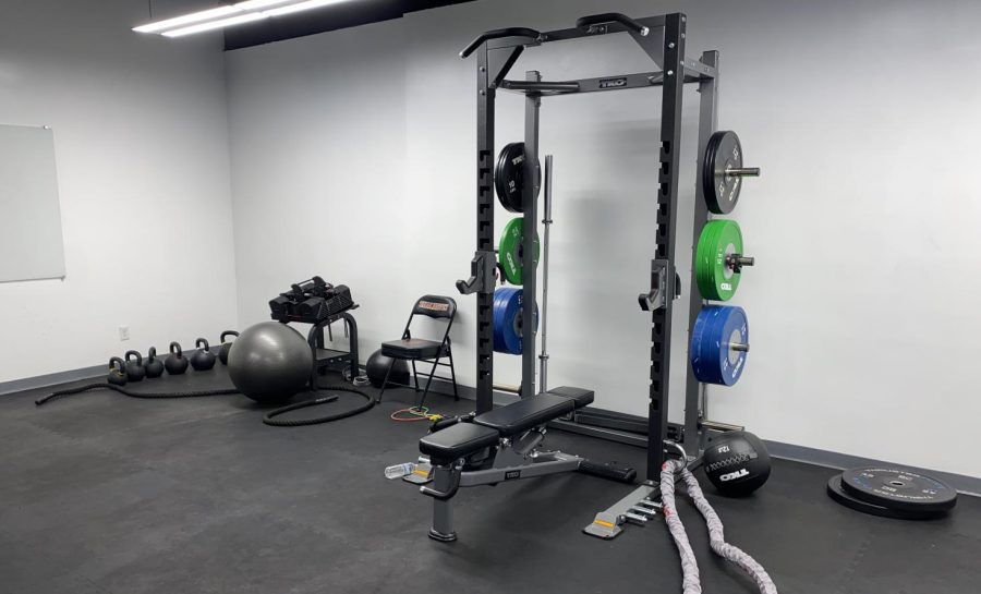 WORKOUT: PE classes this year are using the new weight room in the basement, which is across from B101.