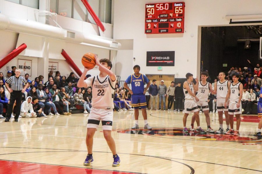 FUTURE: Junior Eytan Ackerman shoots free throws in the fourth quarter against La Mirada. Behind him are fellow juniors Adam Westerman, Ami Kent, Zane Mendelson and Jacob Kilberg, who were brought into the game in the final minutes and together scored 15 points.
