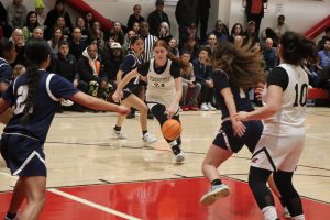 VICTORY: Junior Yalee Schwartz dribbles toward the hoop during the second half of the Firehawks Saturday nights win against Silverado. Shalhevet is set to face Campbell Hall tonight at 7 p.m.