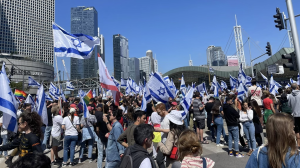 PROTEST: Israelis filled the streets on March 27, the day of the civil strike, outside of the HaShalom Train Station in Tel Aviv. The demonstrations stopped after Prime Minister Netanyahu halted the process of implementing the proposed judicial reforms.