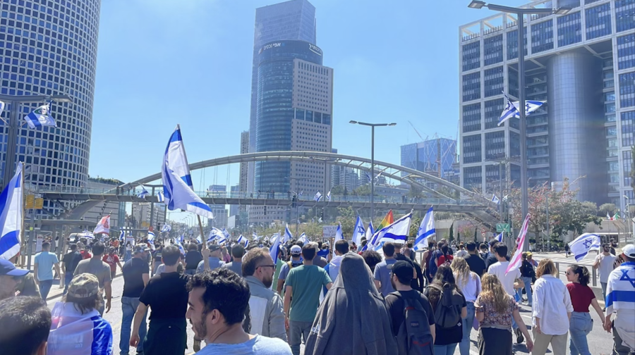 WALKING: Crowding the streets in Tel Aviv, Israel was suspended in a nationwide civil strike on March 27. 