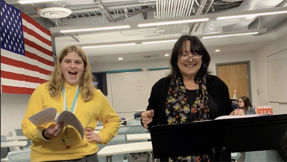 CHOIR: Conducting rehearsal with soloist Emily Klausner at practice in 2019.
